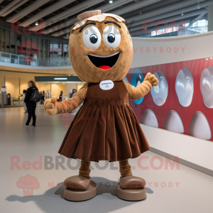 Brown Momentum mascot costume character dressed with a Skirt and Shoe clips