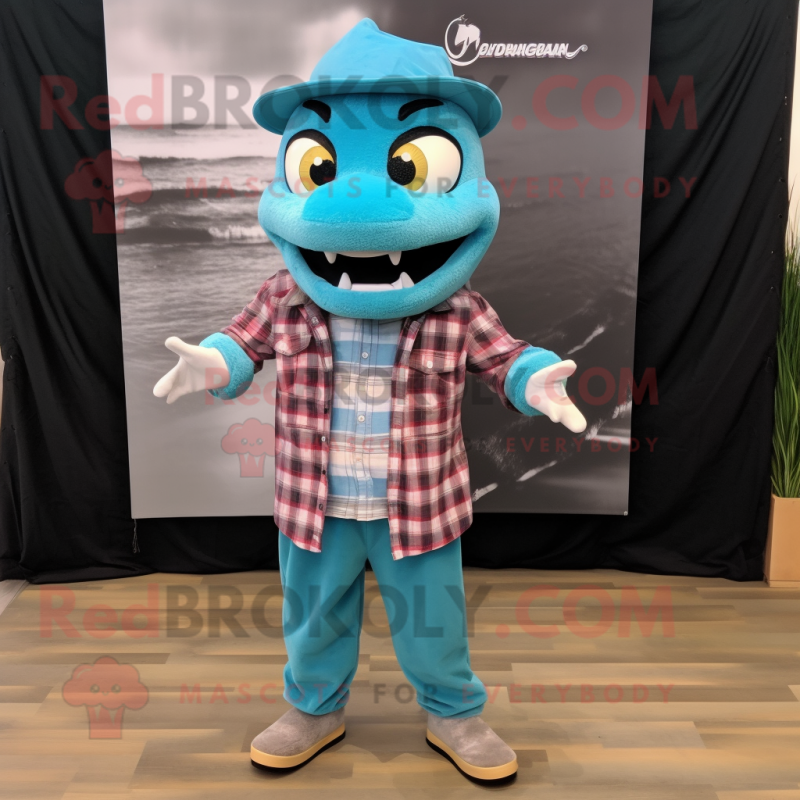 Turquoise Barracuda mascot costume character dressed with a Flannel Shirt and Bow ties