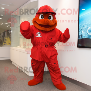 Red Marine Recon mascot costume character dressed with a Raincoat and Gloves