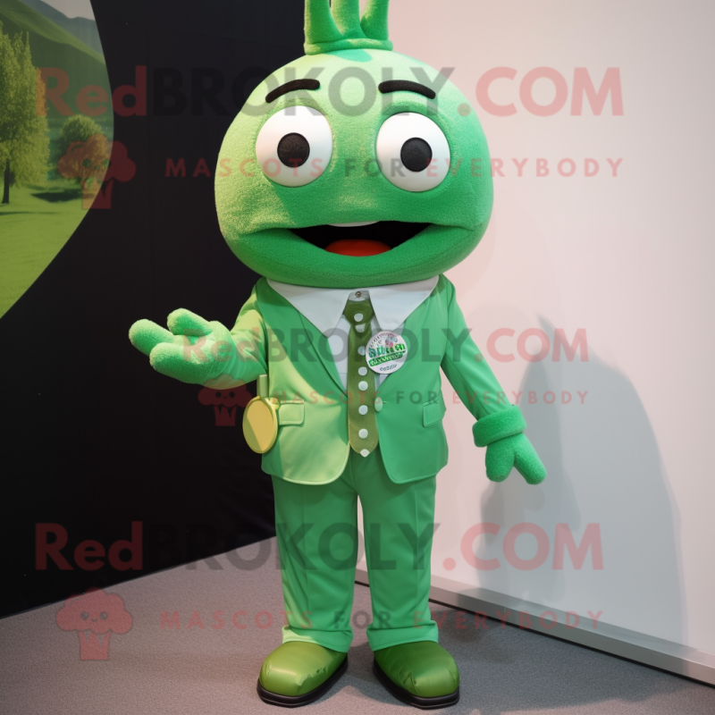 Green Pho mascot costume character dressed with a Chinos and Tie pins Green Pho mascot costume character dressed with a Chinos and Tie pins