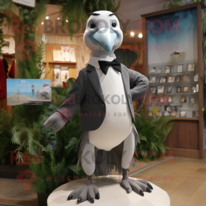 Gray Albatross mascot costume character dressed with a Tuxedo and Anklets