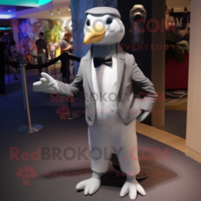 Gray Albatross mascot costume character dressed with a Tuxedo and Anklets