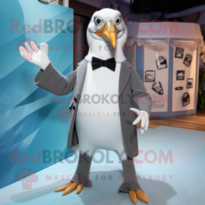 Gray Albatross mascot costume character dressed with a Tuxedo and Anklets