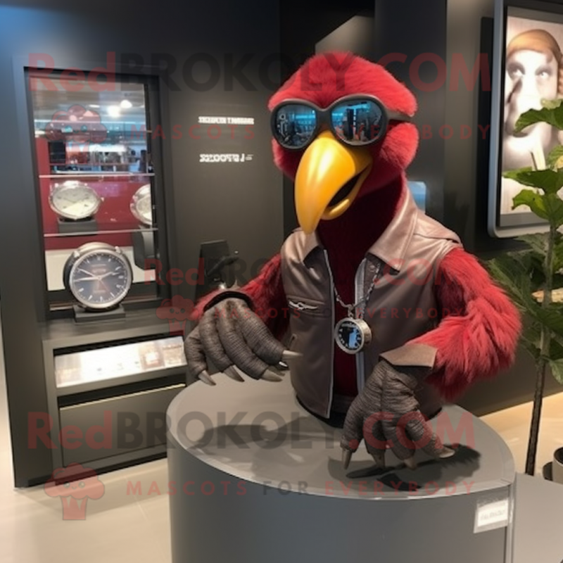 Maroon Dodo Bird mascot costume character dressed with a Moto Jacket and Bracelet watches Maroon Dodo Bird mascot costume character dressed with a Moto Jacket and Bracelet watches