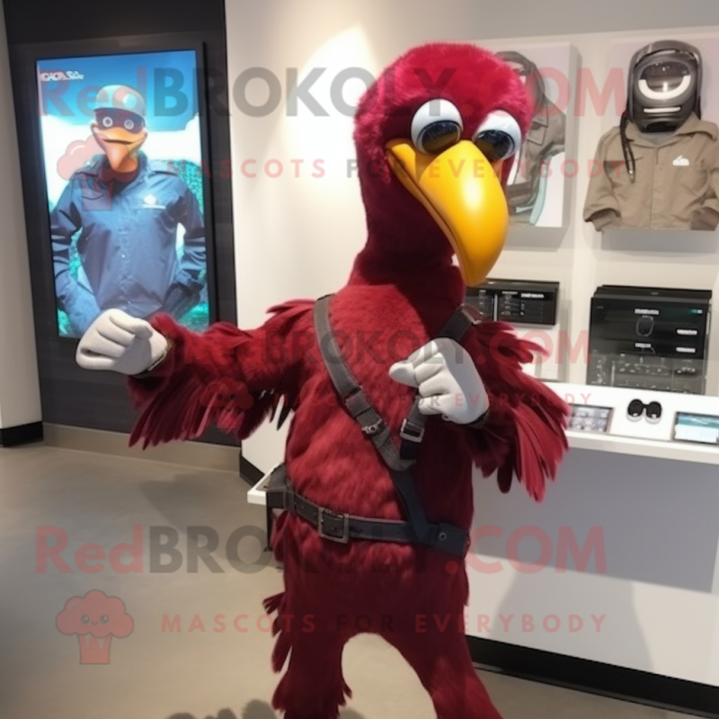 Maroon Dodo Bird mascot costume character dressed with a Moto Jacket and Bracelet watches