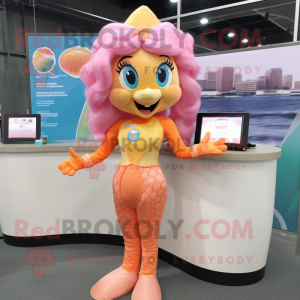 Peach Mermaid mascot costume character dressed with a Rash Guard and Anklets