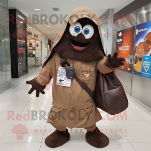 Brown Ghost mascot costume character dressed with a Windbreaker and Messenger bags