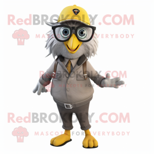 Gray Canary mascot costume character dressed with a Overalls and Eyeglasses