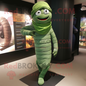 Forest Green Mummy mascot costume character dressed with a Skinny Jeans and Caps