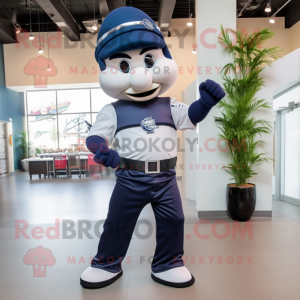 Navy Knife Thrower mascot costume character dressed with a Joggers and Necklaces