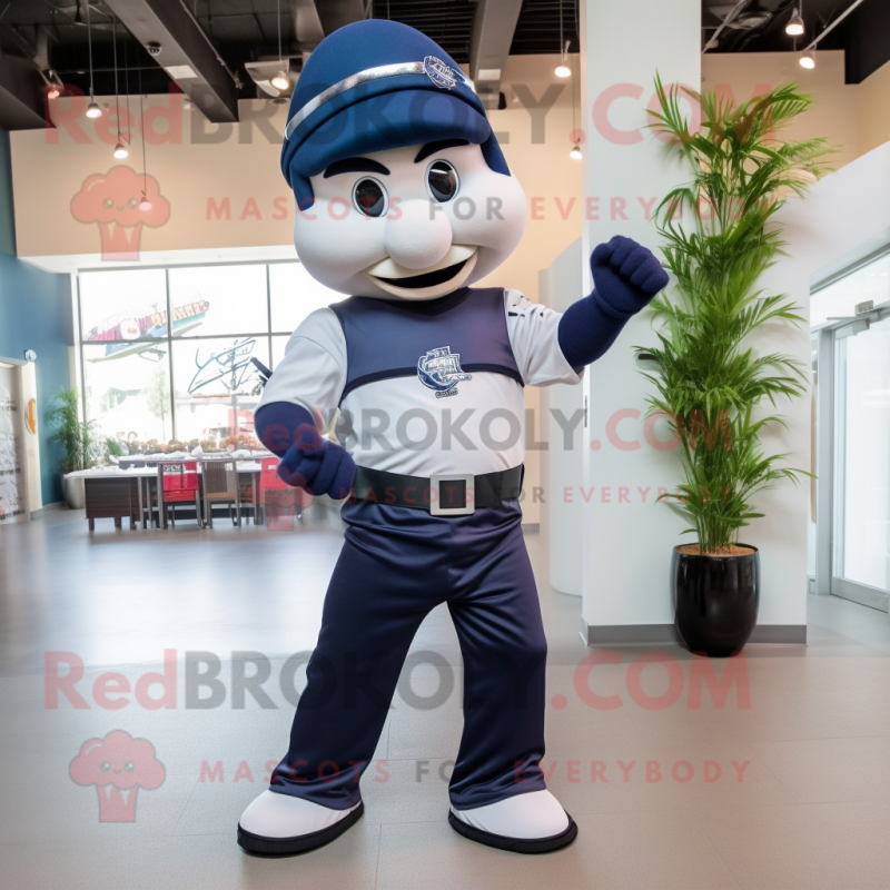Navy Knife Thrower mascot costume character dressed with a Joggers and Necklaces Navy Knife Thrower mascot costume character dressed with a Joggers and Necklaces