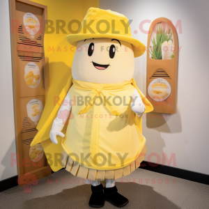 Cream Lemon mascot costume character dressed with a Wrap Skirt and Hat pins