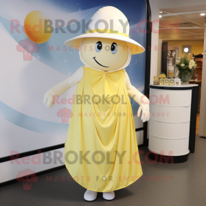 Cream Lemon mascot costume character dressed with a Wrap Skirt and Hat pins