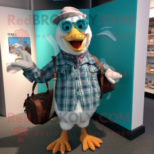 Teal Seagull mascot costume character dressed with a Flannel Shirt and Handbags
