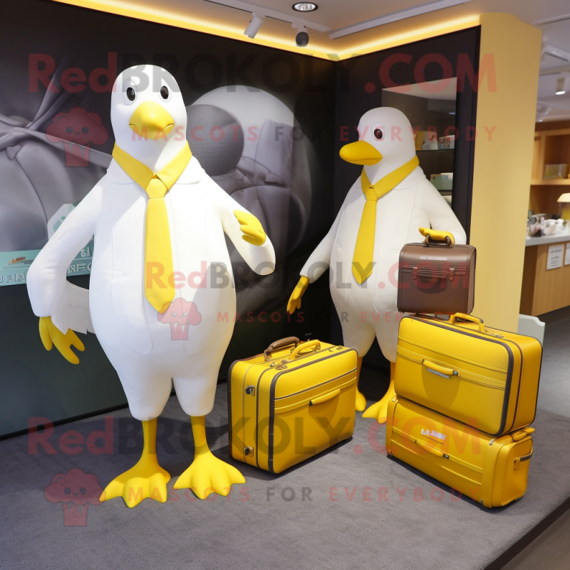 Lemon Yellow Albatross mascot costume character dressed with a Trousers and Briefcases Lemon Yellow Albatross mascot costume character dressed with a Trousers and Briefcases