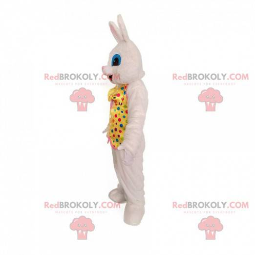 Mascotte de lapin blanc avec une tenue festive. Lapin festif -