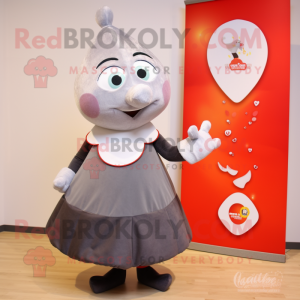 Gray Shakshuka mascot costume character dressed with a Skirt and Brooches
