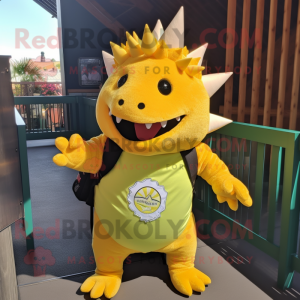 Lemon Yellow Stegosaurus mascot costume character dressed with a Henley Tee and Backpacks