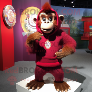 Maroon Monkey mascot costume character dressed with a Sweater and Shawl pins