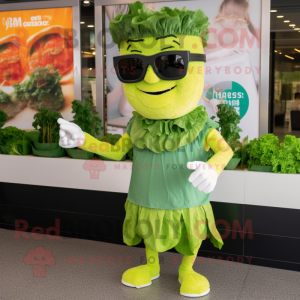 Green Caesar Salad mascot costume character dressed with a Empire Waist Dress and Sunglasses