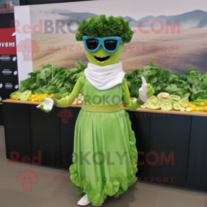 Green Caesar Salad mascot costume character dressed with a Empire Waist Dress and Sunglasses