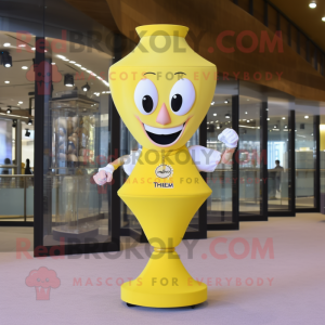 Lemon Yellow Hourglass mascot costume character dressed with a Skinny Jeans and Necklaces