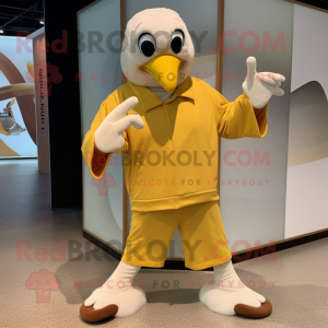 Gold Albatross mascot costume character dressed with a Culottes and Shoe laces