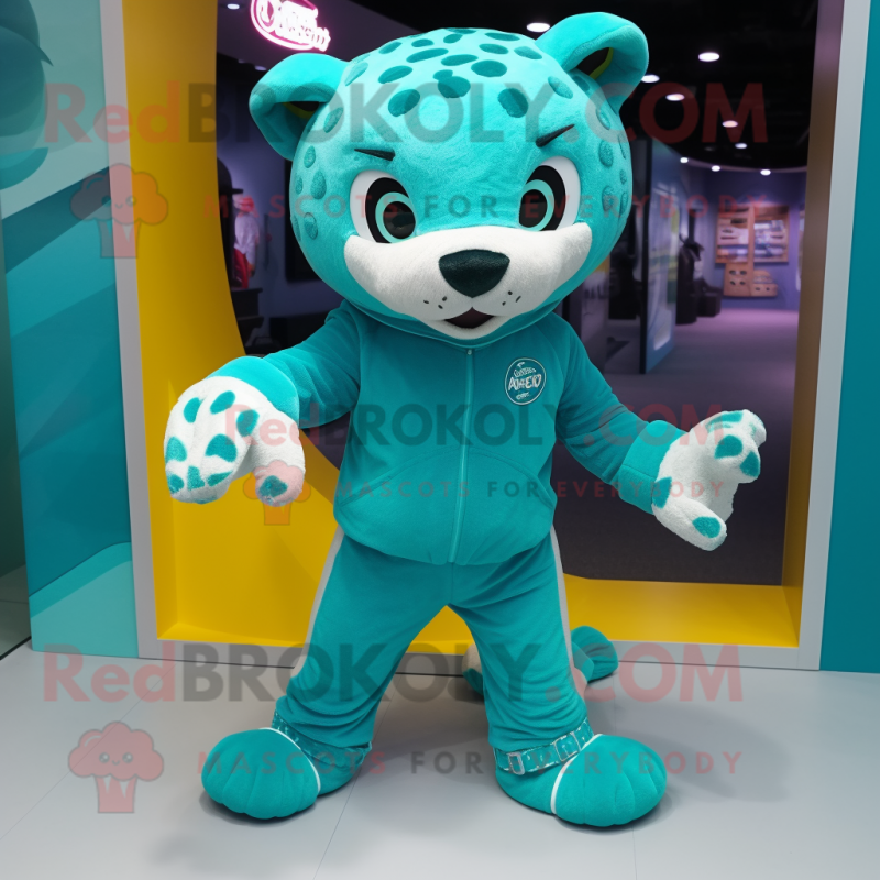 Teal Jaguar mascot costume character dressed with a Jumpsuit and Foot pads