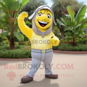 Silver Banana mascot costume character dressed with a Polo Tee and Belts