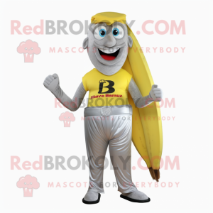 Silver Banana mascot costume character dressed with a Polo Tee and Belts