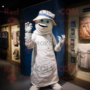 White Mummy mascot costume character dressed with a Chambray Shirt and Hats