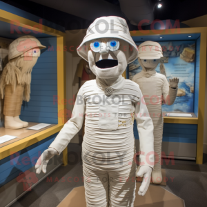 White Mummy mascot costume character dressed with a Chambray Shirt and Hats