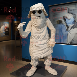 White Mummy mascot costume character dressed with a Chambray Shirt and Hats