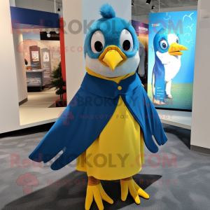 Yellow Blue Jay mascot costume character dressed with a Playsuit and Shawls