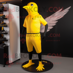 Yellow Blackbird mascot costume character dressed with a Joggers and Foot pads