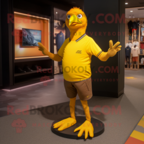 Yellow Blackbird mascot costume character dressed with a Joggers and Foot pads