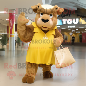 Gold Bison mascot costume character dressed with a Sheath Dress and Tote bags