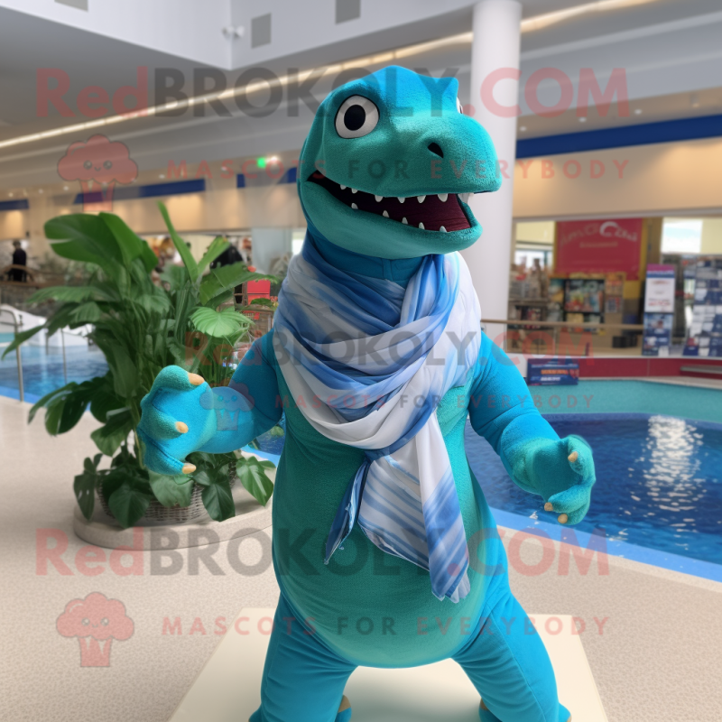 Cyan Allosaurus mascot costume character dressed with a Swimwear and Scarves Cyan Allosaurus mascot costume character dressed with a Swimwear and Scarves