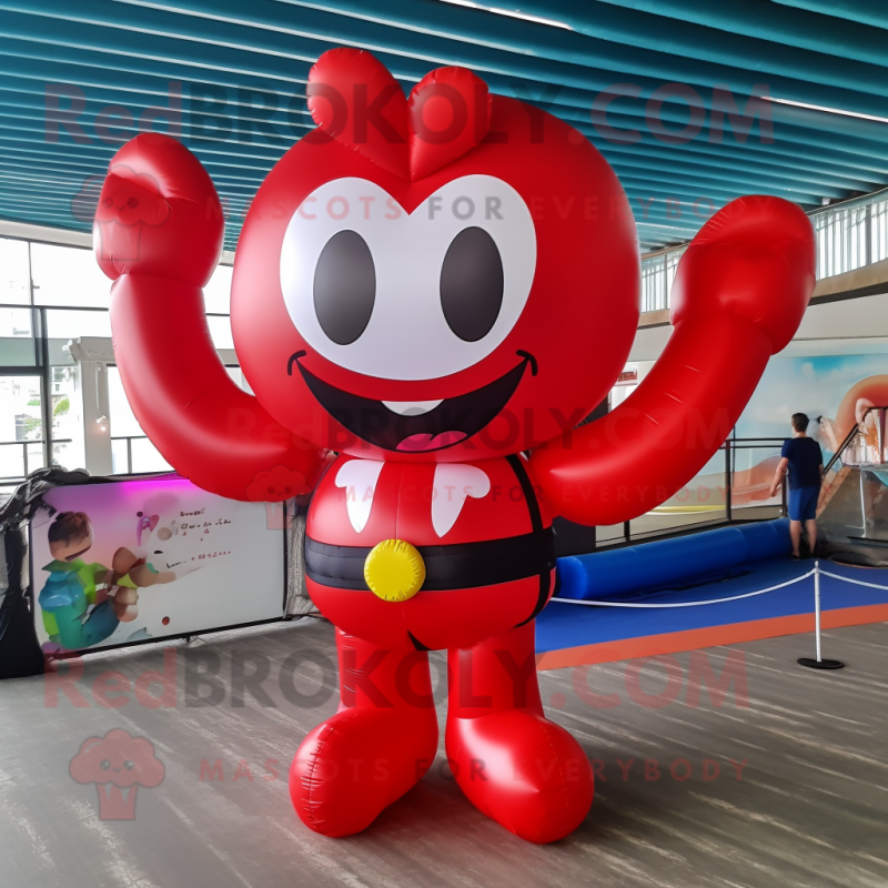 Red Heart Shaped Balloons mascot costume character dressed with a Bikini and Belts Red Heart Shaped Balloons mascot costume character dressed with a Bikini and Belts