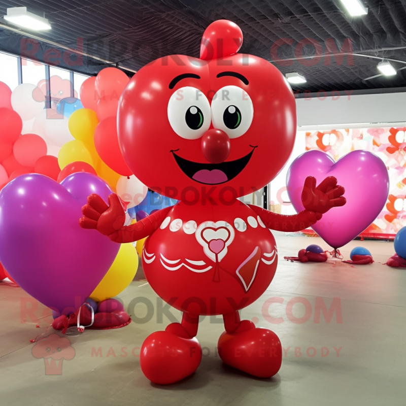 Red Heart Shaped Balloons mascot costume character dressed with a Bikini and Belts Red Heart Shaped Balloons mascot costume character dressed with a Bikini and Belts