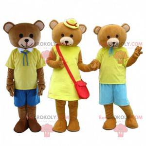 3 maskoti hnědého medvídka oblečeného ve žluté barvě, kostýmy