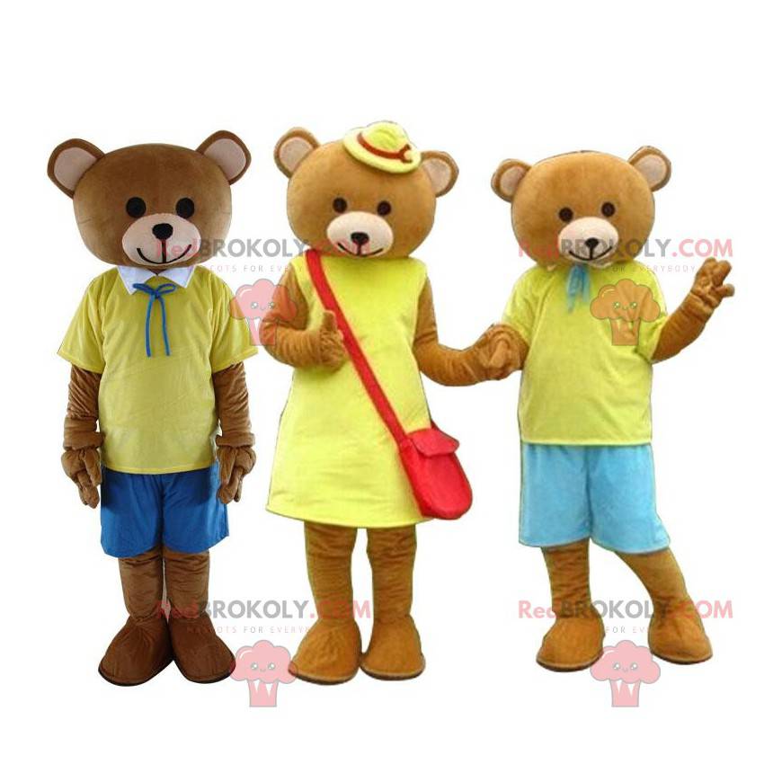 3 bruna nallebjörnmaskoter klädda i gult, björndräkter -