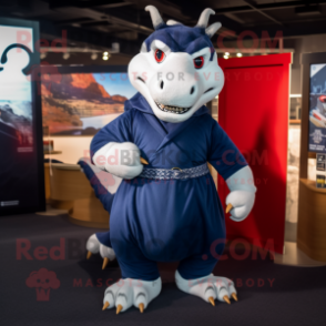 Navy Dragon mascot costume character dressed with a Oxford Shirt and Shawl pins