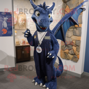 Navy Dragon mascot costume character dressed with a Oxford Shirt and Shawl pins