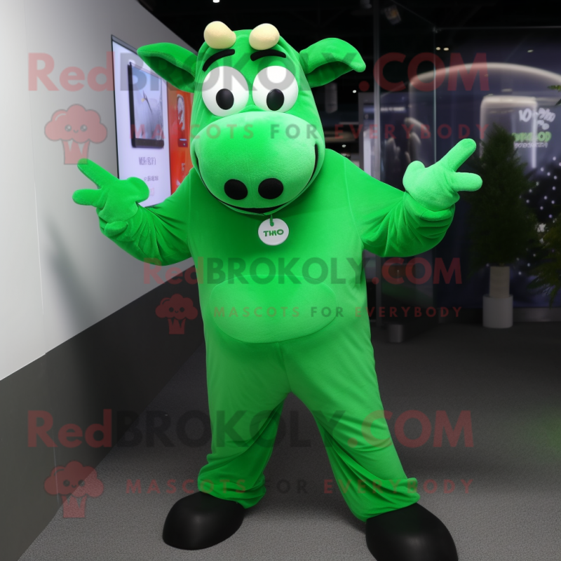 Green Cow mascot costume character dressed with a Hoodie and Cufflinks