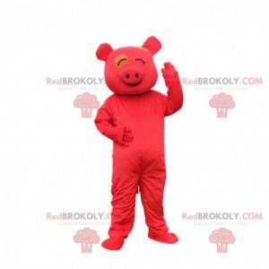 Mascota de cerdo rojo mirando sonriente, traje rojo -