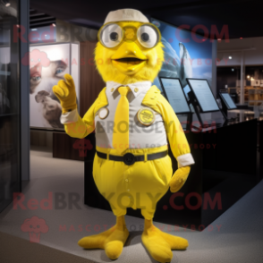 Gold Canary mascot costume character dressed with a Poplin Shirt and Suspenders