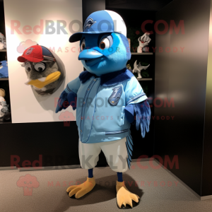 Cyan Blue Jay mascot costume character dressed with a Bomber Jacket and Belts