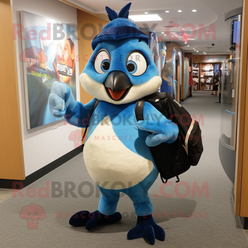 Blue Blue Jay mascot costume character dressed with a Rugby Shirt and Backpacks Blue Blue Jay mascot costume character dressed with a Rugby Shirt and Backpacks