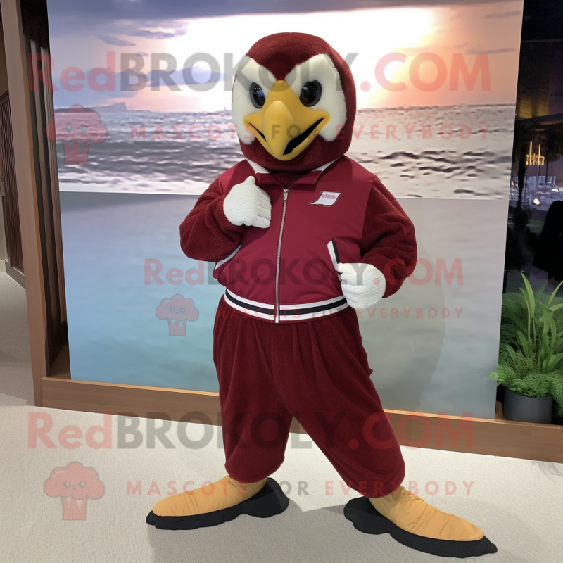 Maroon Falcon mascot costume character dressed with a Sweatshirt and Belts